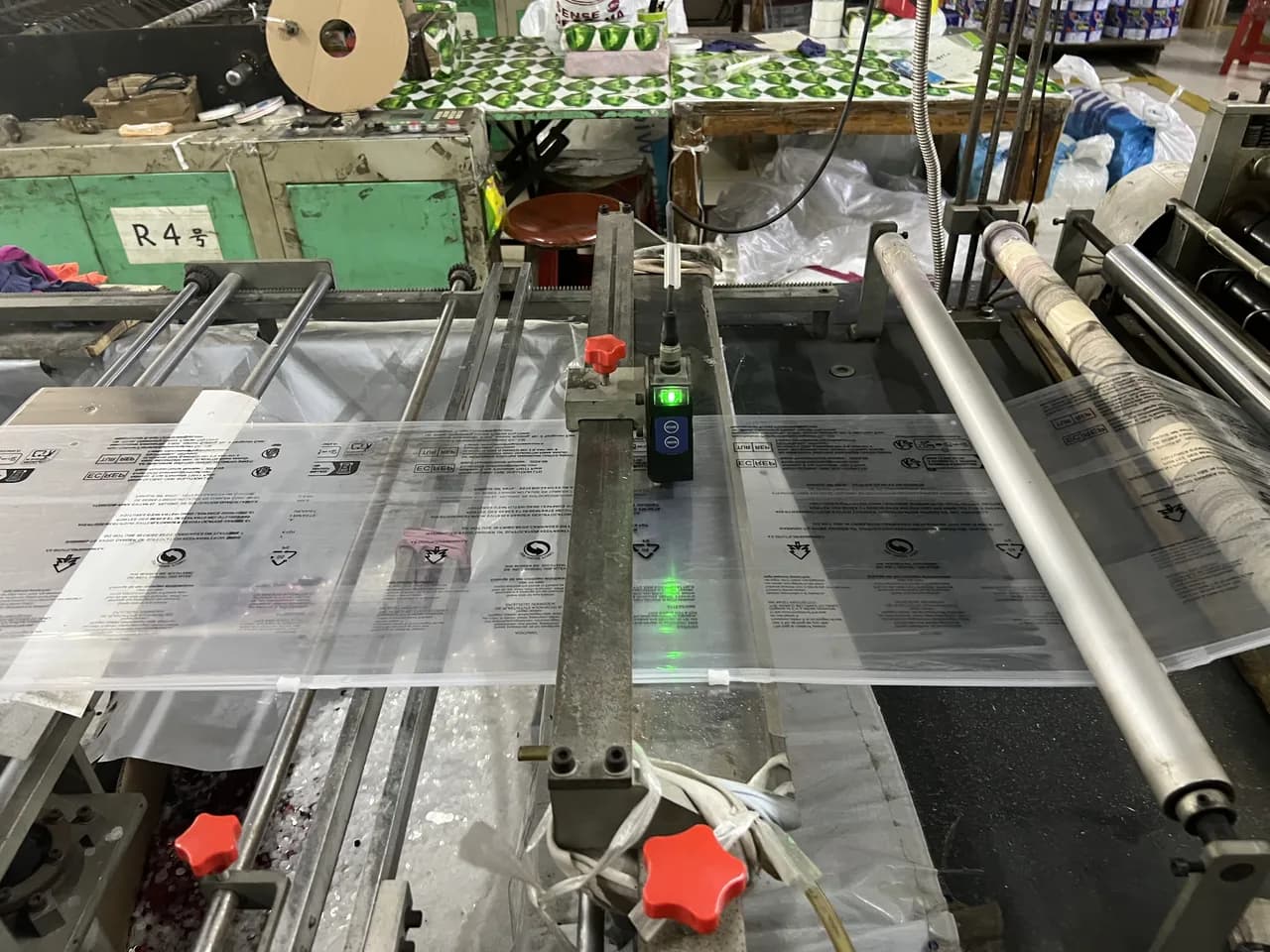 Custom glove packaging film being prepared for printing